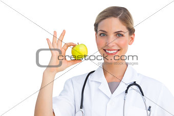 Nurse showing apple