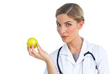 Nurse holding apple