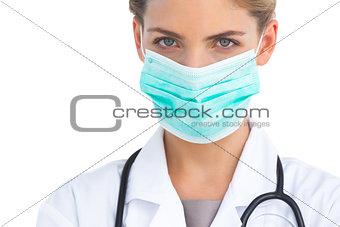 Focus shot on nurse wearing surgical mask