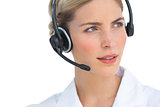 Serious nurse working with headset