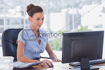 Businesswoman working on her computer