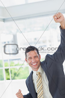 Businessman cheering