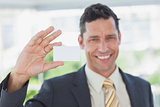 Businessman showing blank business card