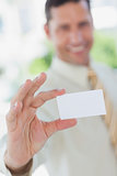 Businessman presenting white business card