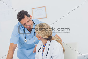 Team of doctors discussing each other