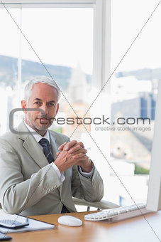 Businessman sitting at his desk