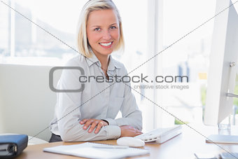 Businesswoman smiling at camera