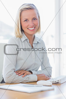 Young businesswoman smiling at camera
