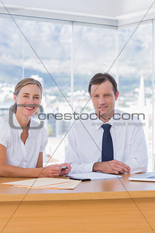 Cheerful business people posing together
