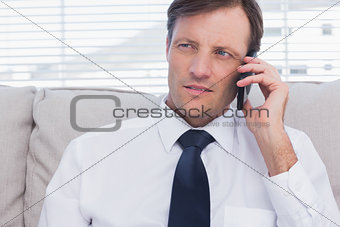 Attractive businessman calling