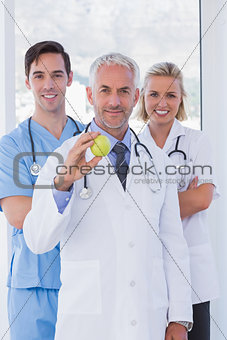 Cheerful medical staff standing together