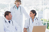 Group of doctors discussing and working together