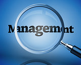 Magnifying glass above the word management