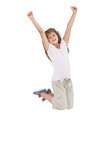 Little girl jumping and putting her hands up