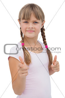 Pretty little girl giving thumbs up