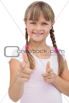 Pretty blonde girl giving thumbs up