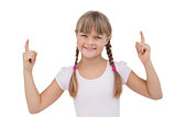 Happy young girl pointing up
