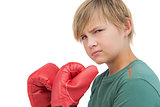 Furious boy with boxing gloves