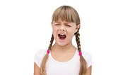 Furious little girl with eyes closed