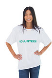 Cheerful woman wearing volunteer tshirt