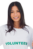 Portrait of an attractive woman wearing volunteer tshirt