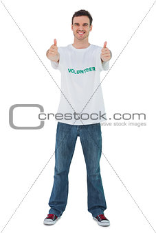 Attractive man wearing volunteer tshirt giving thumbs up