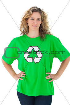 Environmental activist wearing green shirt with recycling symbol on it