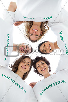 Low angle view of a smiling group of volunteers