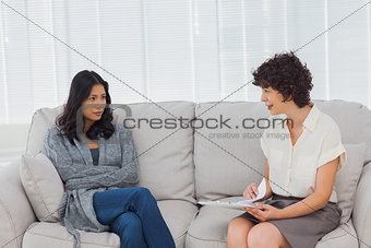 Therapist speaking to her patient