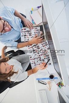 Photo editors working on their computer
