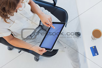 Overview of a designer using her tablet pc