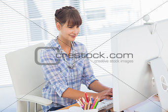 Designer working on her computer