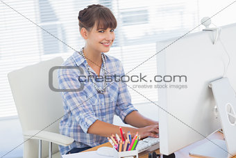 Portrait of a designer working on her computer