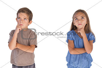 Children daydreaming with arms crossed
