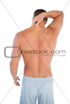 Man wearing shorts having a neck ache
