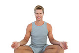 Portrait of a man sitting in lotus position