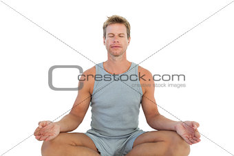 Portrait of a man meditating sat in lotus position