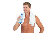 Thirsty man holding a bottle of water
