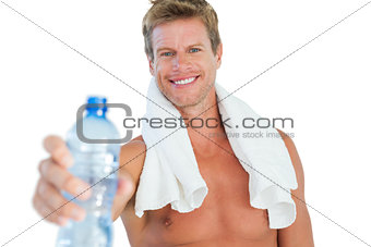 Handsome man offering water