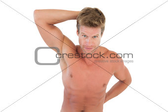 Shirtless attractive man showing his muscles