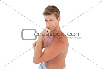 Shirtless handsome man gesturing