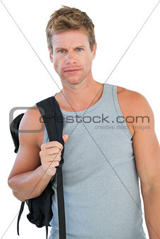Attractive man in sportswear gesturing