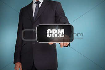 Businessman touching the word crm