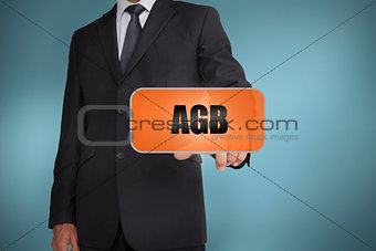 Businessman selecting orange tag with agb written on it