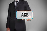 Businessman selecting tag with agb written on it