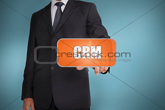 Businessman selecting orange tag with the word crm written on it