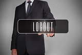 Businessman selecting label with logout written on it