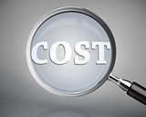 Magnifying glass showing cost word in white