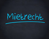 Mietrecht word written in blue on blackboard