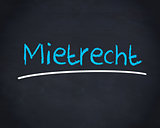 Mietrecht word written in blue on a blackboard